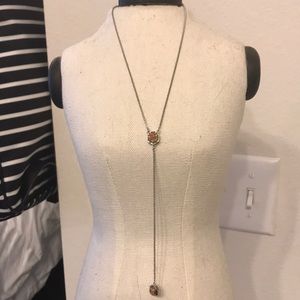 Kendra Scott silver necklace with rose gold stone